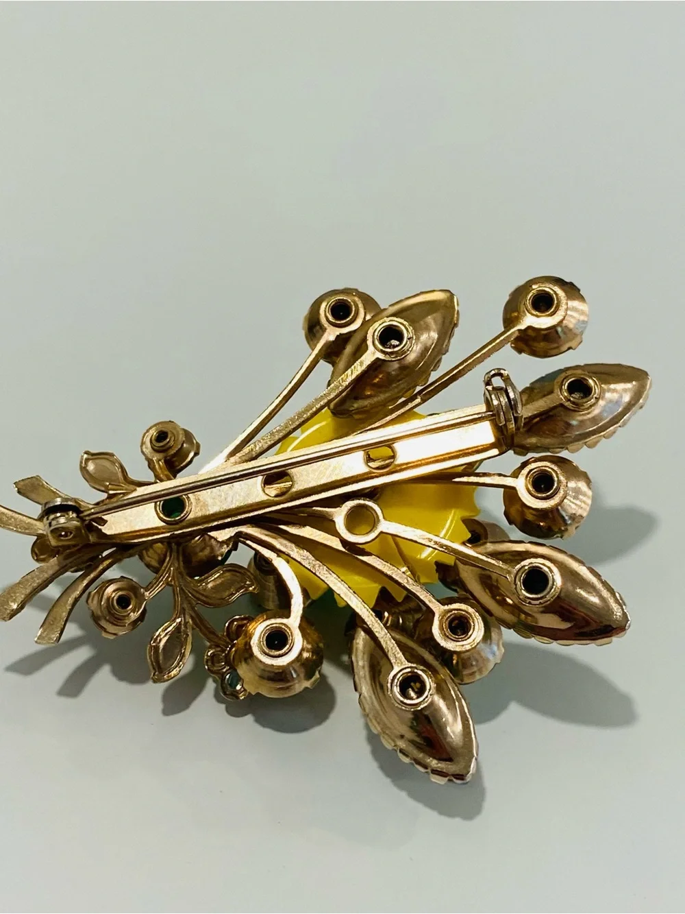 Vintage Green Aurora Borealis Rhinestones Brooch Yellow Plastic Flower Rivets